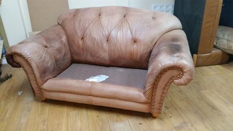 Sun faded Wing sofa without cushions
