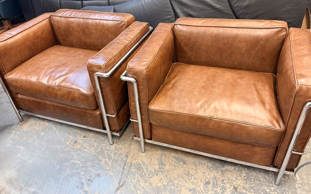 Cassina Le Corbusier LC2 chairs restored and reupholstered in aniline leather by experts in the restoration of Mid century modern furniture